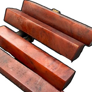 Four red bakelite handles