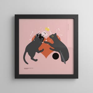 Könnte beinhalten: Gerahmter Kunstdruck mit einer stilisierten Illustration von zwei schwarzen Katzen, die sich über einem orangefarbenen Herzen gegenüberstehen. Der Hintergrund ist rosa, mit verstreuten Knochen und einem schwarzen Kreis.