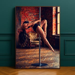 May include: A framed artwork showing a person pole dancing. The person is wearing black athletic clothing and is upside down, arched over the pole. The background includes a brick wall, a window, and a vintage chair.