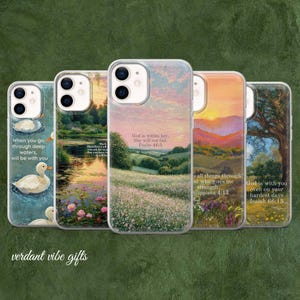 May include: A collection of phone cases with nature-themed designs and inspirational quotes. The cases feature images of ducks, landscapes, and sunsets. The text on the cases includes Bible verses and the phrase "verdant vibe gifts."