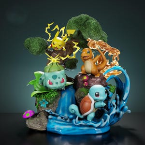 May include: A detailed figurine featuring four colorful Pokémon characters: Pikachu, Charmander, Bulbasaur, and Squirtle. The scene includes a waterfall, foliage, and stylized effects representing fire and electricity. The base is dark, and the background is a gradient.