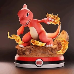 May include: A red and cream-colored figurine of a cartoon dragon-like creature with flames. The figurine is on a brown, rocky base, with a red and black circular base that has the number 005 on it.