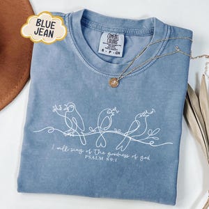 May include: A set of three ceramic mugs with a speckled, matte finish. The mugs are in shades of cream, light brown, and dark brown. Each mug has a simple, minimalist design, perfect for coffee or tea.