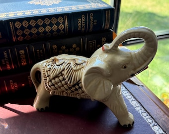 Vintage Ceramic Elephant Figurine, Raised Trunk Ivory Tone Decor, Hollywood Regency Shelf Styling