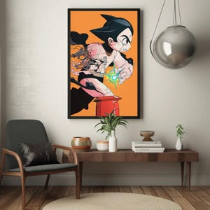 May include: A framed art print featuring a stylized illustration of a robot boy with black hair and a red and white outfit against an orange background. The artwork has a dynamic pose with a glowing energy effect.