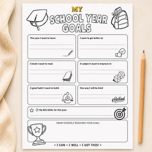 May include: A white paper worksheet titled MY SCHOOL YEAR GOALS with black line art illustrations including a graduation cap, backpack, pencil, book, dice, apple, target, and trophy. The sheet features sections for writing goals and a space to draw.