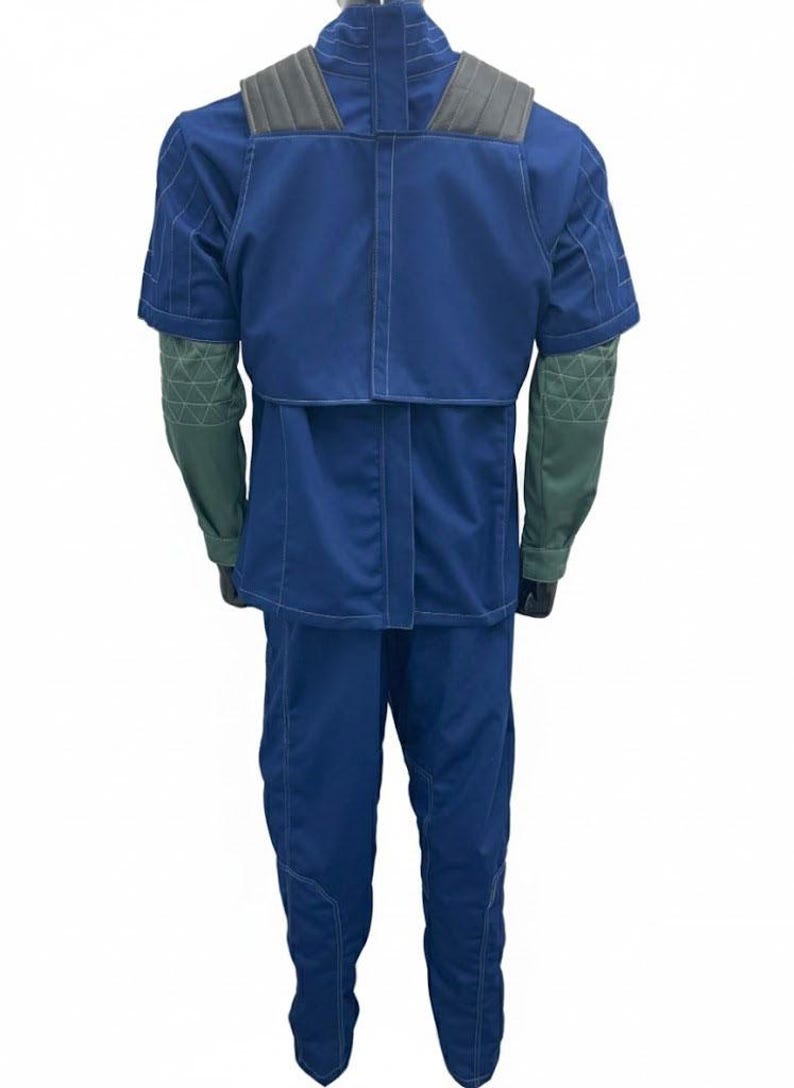 May include: A blue jumpsuit with short sleeves and a high collar. The shoulders have gray padded accents. The sleeves are green with a geometric pattern. The pants are blue and have a seam down the front.