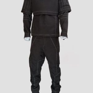 May include: A dark brown tactical suit with white stitching details. The outfit includes a high-neck jacket with a chest panel and long sleeves, and matching pants. The suit is displayed on a mannequin, showcasing its design and construction.