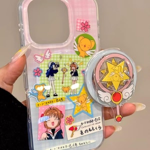 Funda con soporte magnético giratorio y diseño de varita mágica de Cardcaptor Sakura, con estampado de cuadros rosas y azules, compatible con MagSafe, para iPhone 17 / 16 / 15 Pro Max