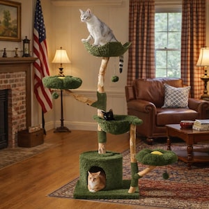 May include: A multi-level cat tree featuring a natural wood trunk, green carpeted platforms, and a circular base. A grey and white cat sits on the top platform, a black cat rests in the middle bowl, and an orange cat sits inside the base cubby.