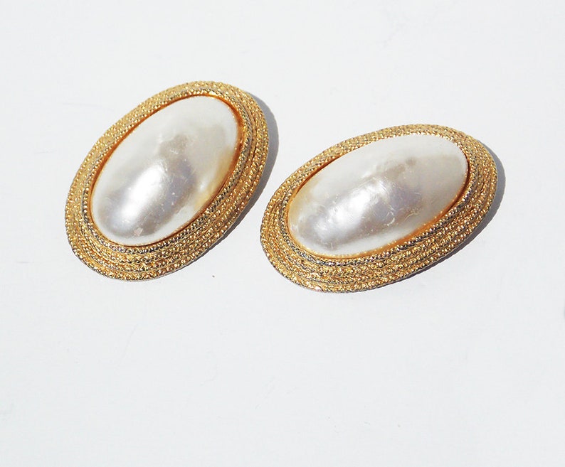 Large Faux Pearl Clipon Earrings Mounted in a Goldtone Metal