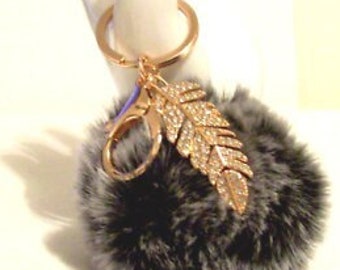 Key chain smokey gray pom pom, real rabbit fur, gold feather