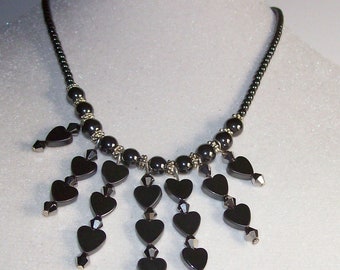 Necklace-Hematite hearts necklace, 4 mm silver colored crystals & daisy spacers strung with 2 mm Hematite beads