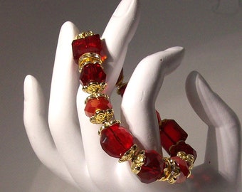 Red 12 mm crystal beads stretch bracelet 7 and half inches around