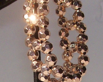 Bracelet (5) oval bead crystal woven stretch bracelets, 1 black, 1 lt blue, 1 dr blue, gold, red