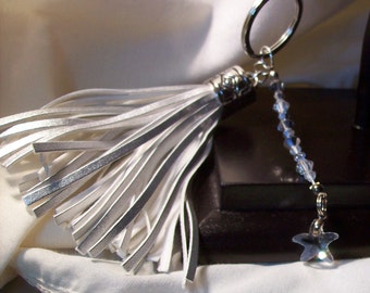 Key chain fringe style. strand of silver 4 and 6 mm bicone crystals