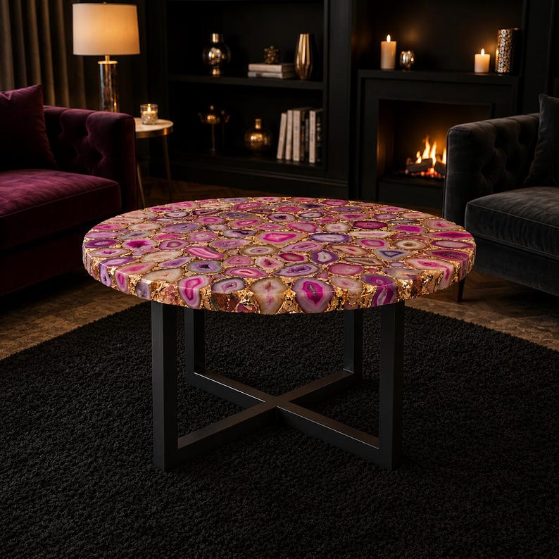 Elegant luxury living room coffee table with pink agate surface and geometric base