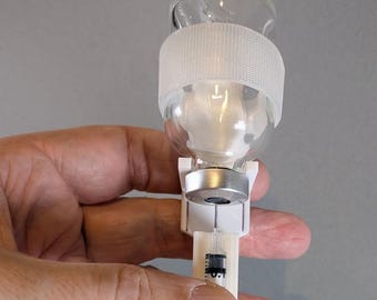 BIGGER Adjustable syringe guide and vial holder with user-friendly finger handle