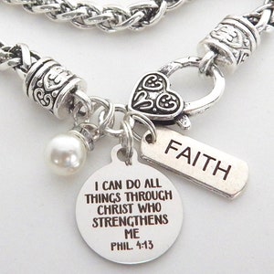 May include: Silver bracelet with a braided chain, a heart charm, a pearl bead, and two tags. One tag says "FAITH" and the other says "I can do all things through Christ who strengthens me. Phil. 4:13."