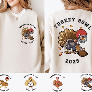 May include: A beige crewneck sweatshirt featuring a graphic of a turkey wearing a red football helmet and holding a football. The front has a small left-chest print, while the back displays a large version with the text TURKEY BOWL 2025.