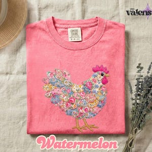 May include: A pink t-shirt with a floral chicken design. The chicken is made of fabric patches with blue, pink, and yellow floral patterns. The word "Watermelon" is written in a cursive font at the bottom.