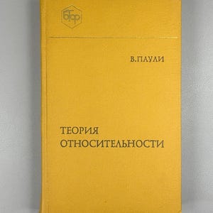 May include: A white ceramic mug with a black handle and the text "But First, Coffee" in a bold, black font. The mug is set against a neutral background, highlighting its simple design.