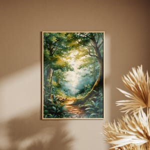 May include: A framed watercolour painting of a forest scene. The artwork depicts a sunlit path winding through lush green trees and foliage. The painting has a warm, inviting colour palette with shades of green, brown, and yellow.