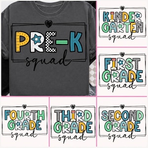 May include: A charcoal gray t-shirt featuring a graphic with the text PRE-K squad in a black rectangular frame with a heart. Additional graphic options include text for Kindergarten, First, Second, Third, and Fourth Grade squad designs.