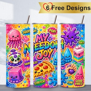 May include: Three cylindrical tumblers with straws, featuring a vibrant rainbow-colored background with cartoon graphics including a pink jellyfish, a floral skull, a purple cube, a pizza slice, a cake, and the text "MY NEED OF JOY".
