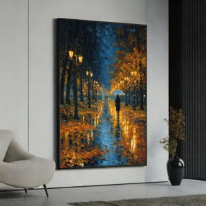 May include: A framed oil painting depicts a rainy park scene at night. A person with an umbrella walks down a path lined with trees and streetlights. The ground reflects the lights and colors of the trees.