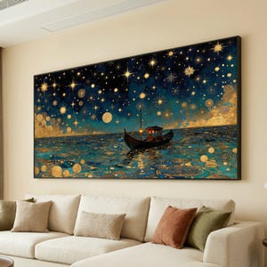 May include: A rectangular wall art print featuring a small boat floating on a dark blue sea under a night sky filled with glowing golden stars and circular patterns. The scene uses a deep colour palette of navy, teal, and metallic gold accents.