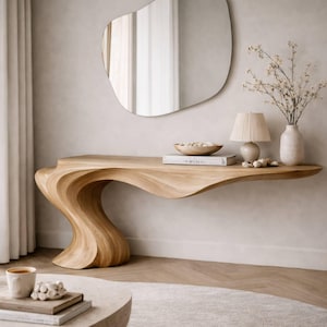 Konsola z rzeźbionego drewna organicznego, stolik wejściowy z zakrzywioną falą, nowoczesny minimalistyczny akcent w korytarzu, stolik kawowy z wyrazistym wzorem