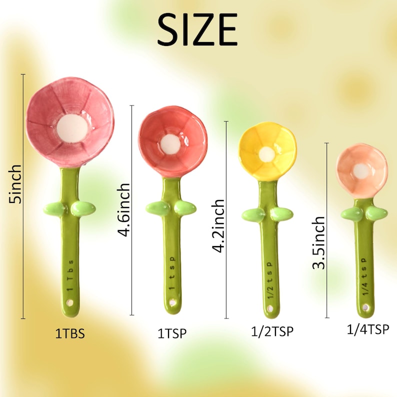 May include: A set of four flower-shaped measuring spoons. The spoons are in shades of pink, red, and yellow, with green stems and leaf accents. Sizes range from 1/4 tsp to 1 Tbsp, with the largest spoon measuring 5 inches.