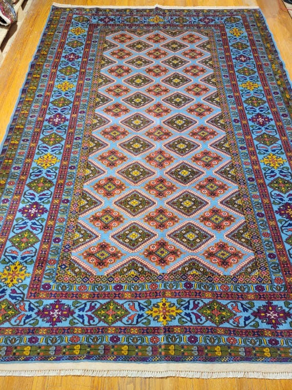 Blue Bokhara 7’ x 10’ Hand Knotted Wool Rug