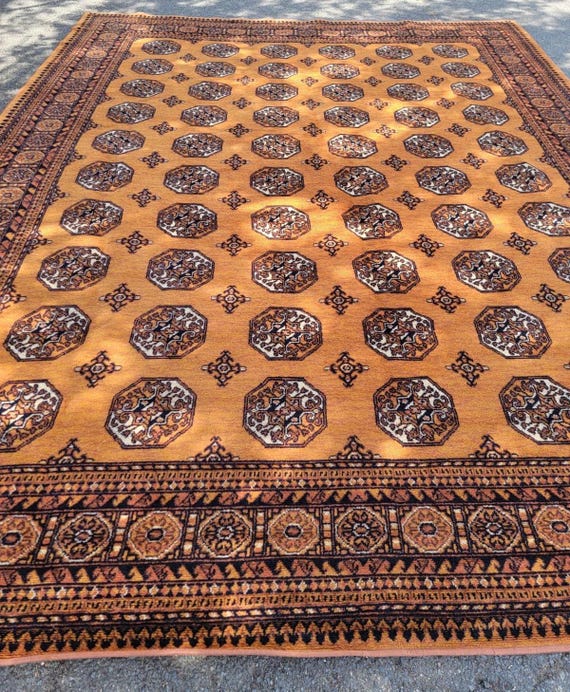 Oriental Karastan Golden Bokhara 10’4” X 14’0” Wool Rug