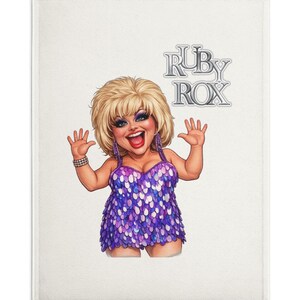 May include: A cartoon illustration of a person with blonde hair, wearing a purple dress with a scale-like pattern. The person is smiling and waving. The text "RUBY ROX" is above the person.