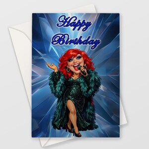 May include: A birthday card with a cartoon illustration of a singer with red hair, wearing a green sequined dress and a feathered coat. The words "Happy Birthday" are written in blue script. The background is a blue, geometric design.