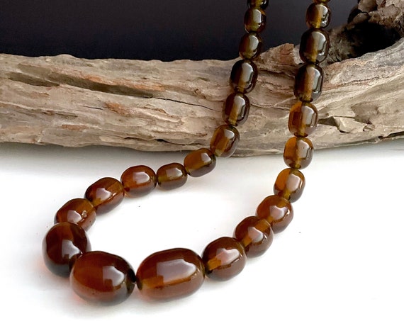 Vintage Beaded Necklace Amber Toned Graduated Large Plastic Bead Necklace 1960s Rusty Brown Semi Translucent Beads Oblong Root Beer Color