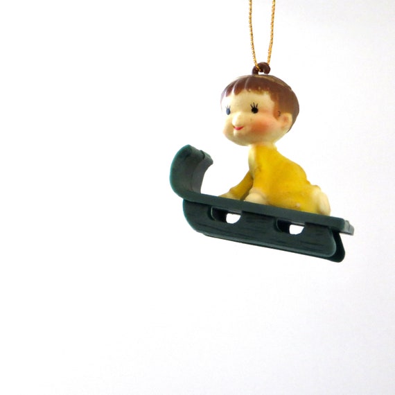 Vintage Sled Ornament Baby on Sled Plastic Green with Yellow Boy Ornament Kid Sledding 1970s Christmas Tree Trim Small Boy Brown Hair