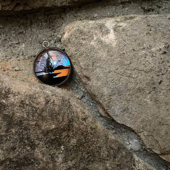 Vintage Pendant Morpho Reverse Painted Butterfly Wing Necklace Small Pine Tree Lake Scene in Black On Iridescent Purple Blue Orange Wing