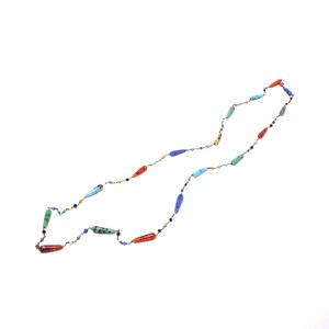 May include: A long necklace with colorful, teardrop-shaped beads. The beads are made of various gemstones, including turquoise, red jasper, and carnelian.