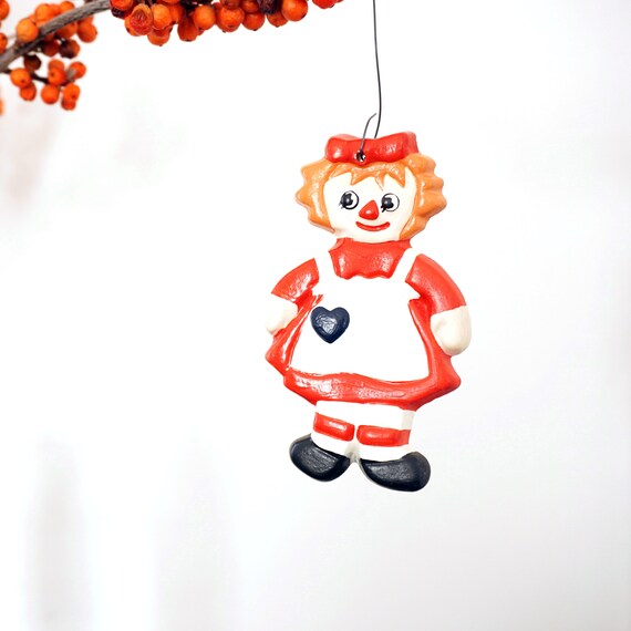 Vintage Raggedy Ann Ornament Hand Painted Clay Cookie Shaped Christmas Tree Ornament 1970s Ginger Hair Doll Red White Dress Black Heart