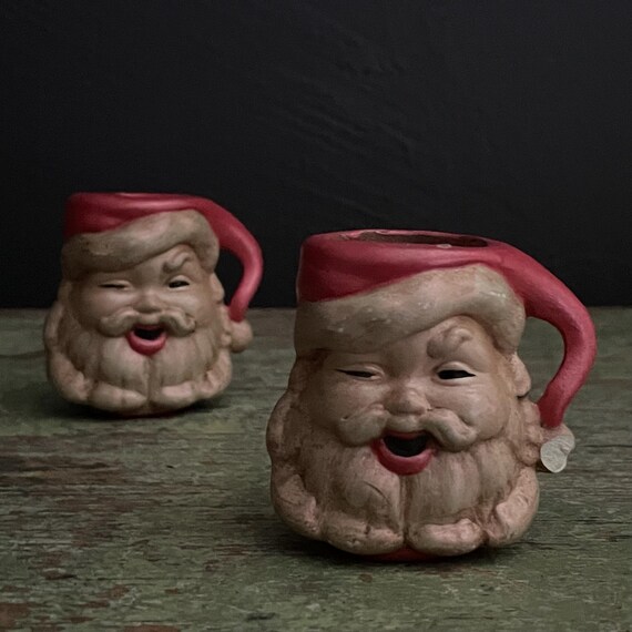 Santa Candle Holders Taper Candles Santa Claus Faces Tiny Mugs Handmade Ceramic Hand Painted Red White Rustic Look Christmas Mantel Tabletop