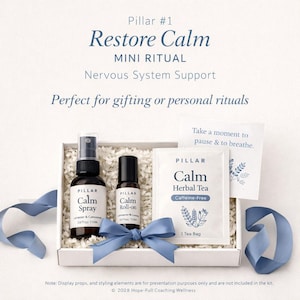 Restore Calm - Mini Ritual Wellness Kit Includes: 15 ml essential oil Calm Spray, 5 ml essential oil Calm Roll-on, botanical Calm Tea or herbal Calm Sachet, inspirational Calm Ritual card. The kit is designed for nervous system support.
Note: Display props, and styling elements are for presentation purposes only and are not included in the kit.