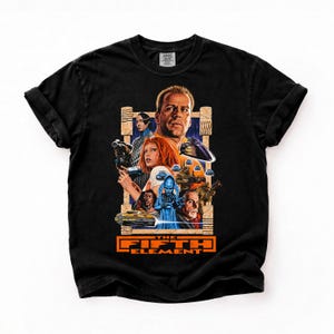 May include: A black short-sleeve t-shirt featuring a graphic print from The Fifth Element movie. The design displays a collage of characters including Leeloo and Korben Dallas, a flying car, and the text The Fifth Element in orange.