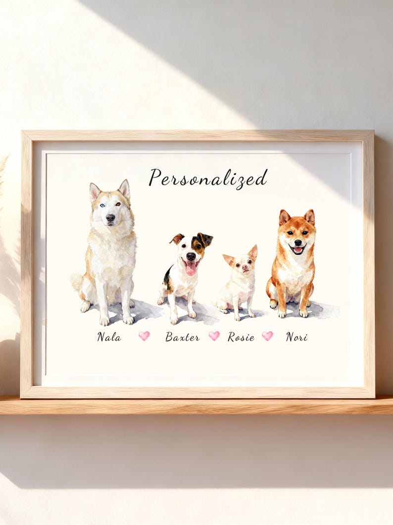 May include: A framed watercolor print featuring four dogs sitting in a row with the text Personalized above them. The names Nala, Baxter, Rosie, and Nori are printed below each dog, separated by small pink hearts on a white background.
