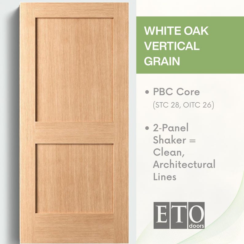 May include: A two-panel white oak door with vertical grain. The door has a light brown color and a simple, clean design. The text on the right side of the door says "WHITE OAK VERTICAL GRAIN".