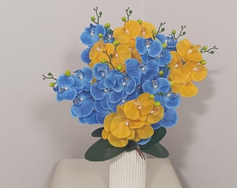 Large Blue and Yellow Orchid Arrangement in White Ribbed Vase