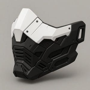 May include: A futuristic-style face mask in black and white. The mask has a geometric design with a white upper section and a black lower section. It features ventilation holes and a sleek, angular aesthetic, suggesting a sci-fi or tactical theme.