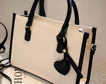 エレガントなクリーム＆ブラックレザーハンドバッグ（女性用） – シックで多用途、そしてファッショナブル